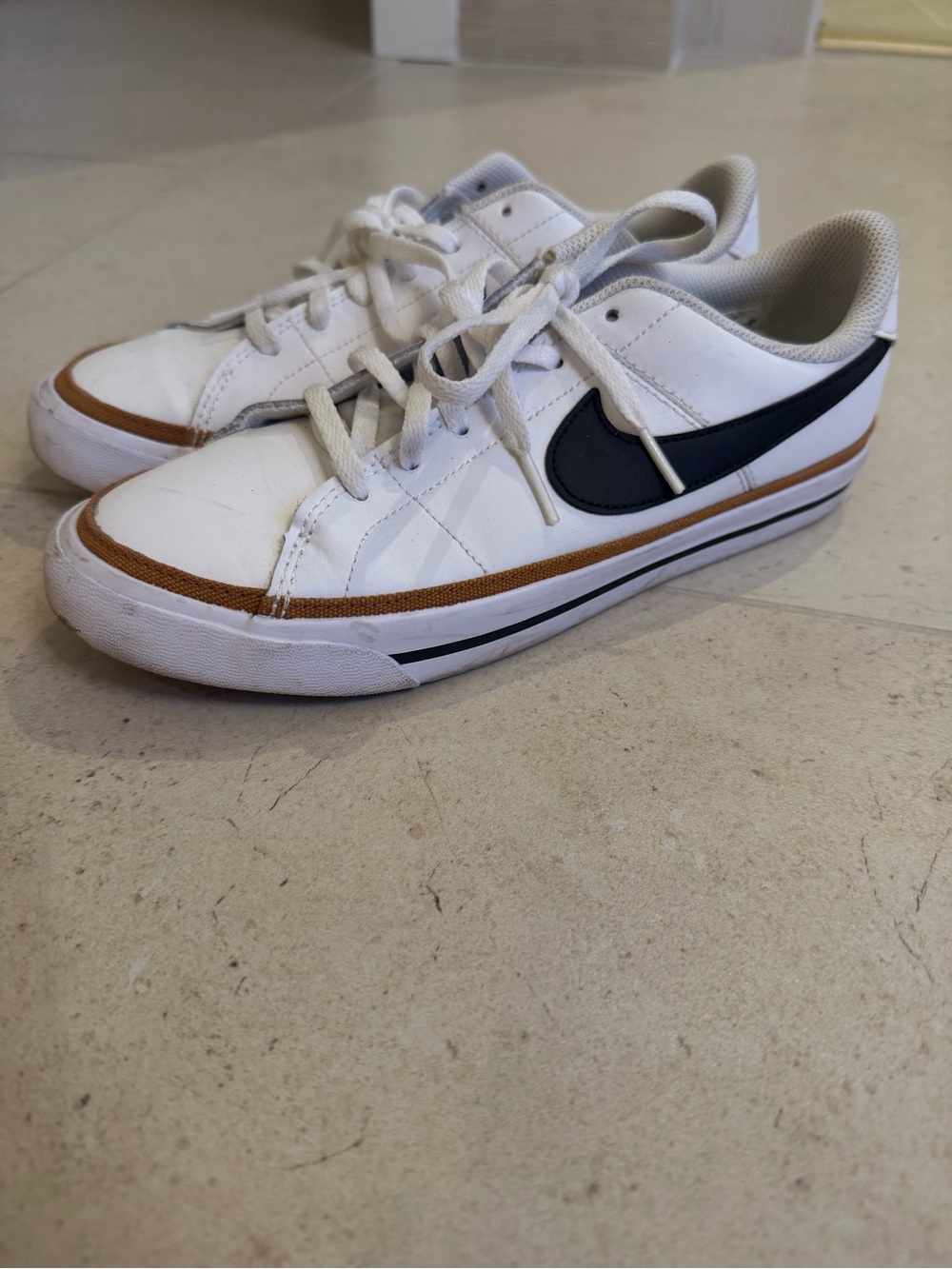 Nike big boys 6.5 (women’s 8)White Sneakers with Black Swoosh and Brown Trim